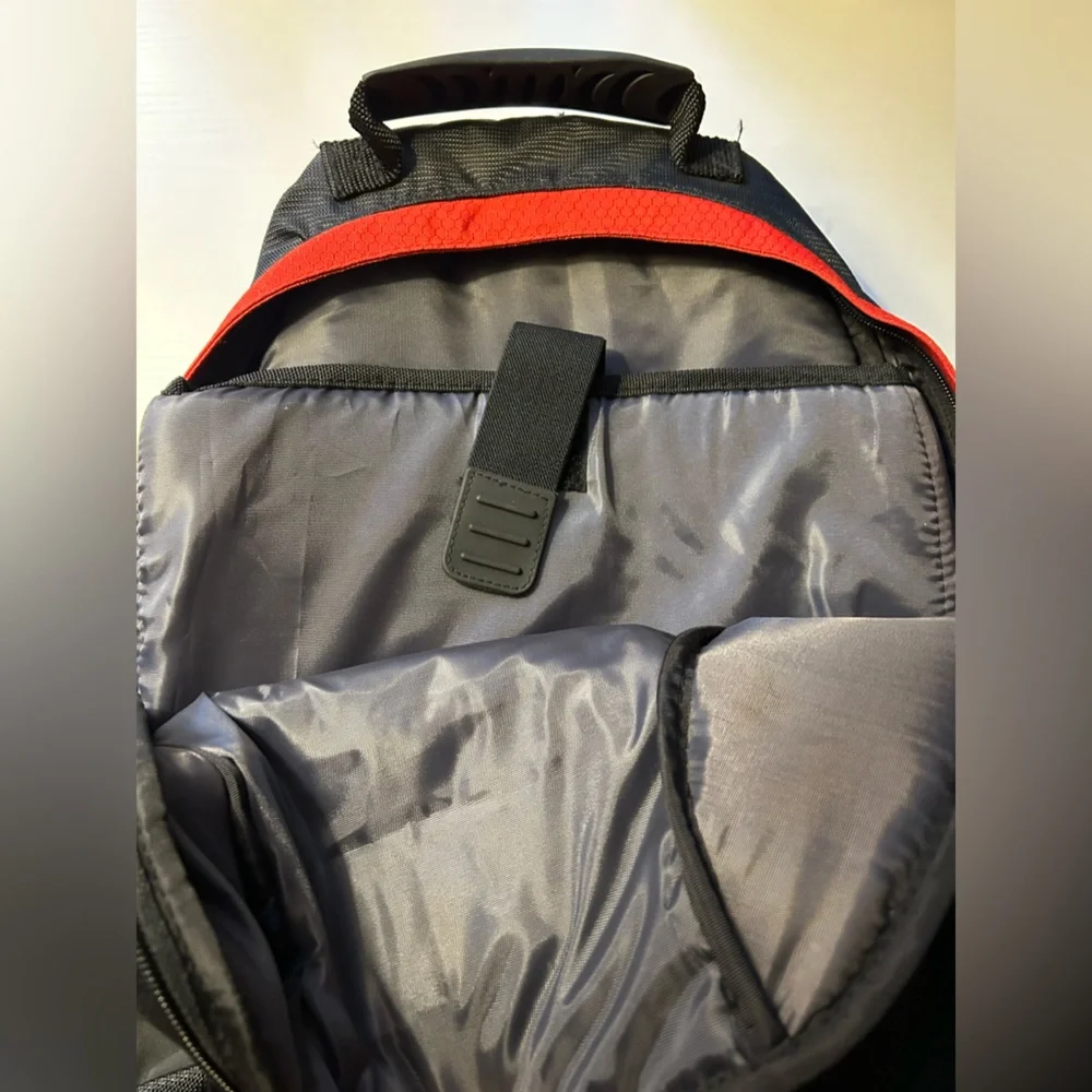 NWOT red and black padded backpack